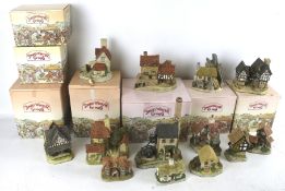 A collection of assorted David Winter model cottages.