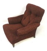 A red upholstered armchair.
