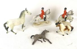 An assortment of porcelain horses.