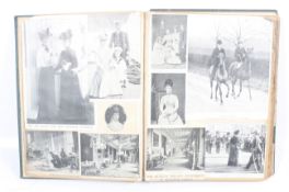 An antique scrap book. Containing images of the monarchy, historical figures, royal residences, etc.