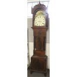 A mahogany inlaid long case clock. The face signed 'Harris, Westbury'.