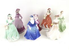 Seven Coalport porcelain figures of ladies. Including 'Beau Monde Jill', 'Andrea', 'In Love', etc.