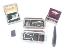 A collection of vintage razors. Including two boxed Gillettes, etc.