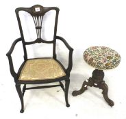 An Edwardian mahogany inlaid open arm chair and a rotating piano stool. Max.