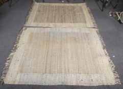 Two coarse woven wool rugs.