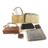 A collection of ladies vintage handbags and purses.