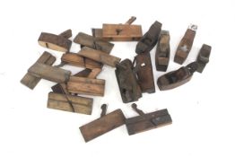 A collection of assorted carpenter's beech planes.