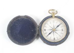 A vintage brass compass. In a fitted leather case, Diameter 4.