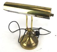 A Wisteria adjustable brass piano lamp. T187.