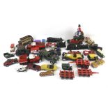 An assortment of diecast and model vehicles.