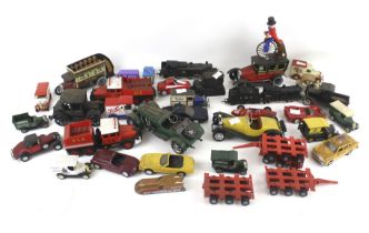 An assortment of diecast and model vehicles.