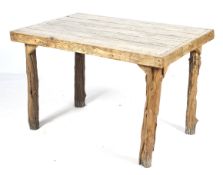 A rustic hardwood dining table.