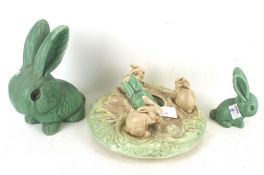 A collection of Sylvac Pottery. Comprising a set of three green glazed rabbits and a posy bowl, Max.