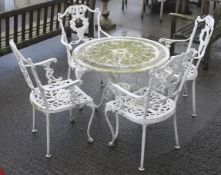 Garden table and chairs Condition Report: Table is a little wobbly,