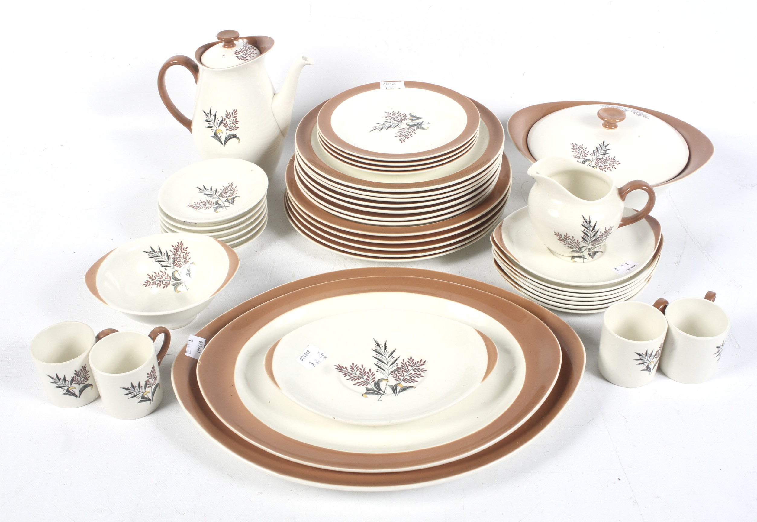 A Wedgwood 'Bay Leaf' dinner and coffee service. Including cups and saucers, plates, dishes, etc.
