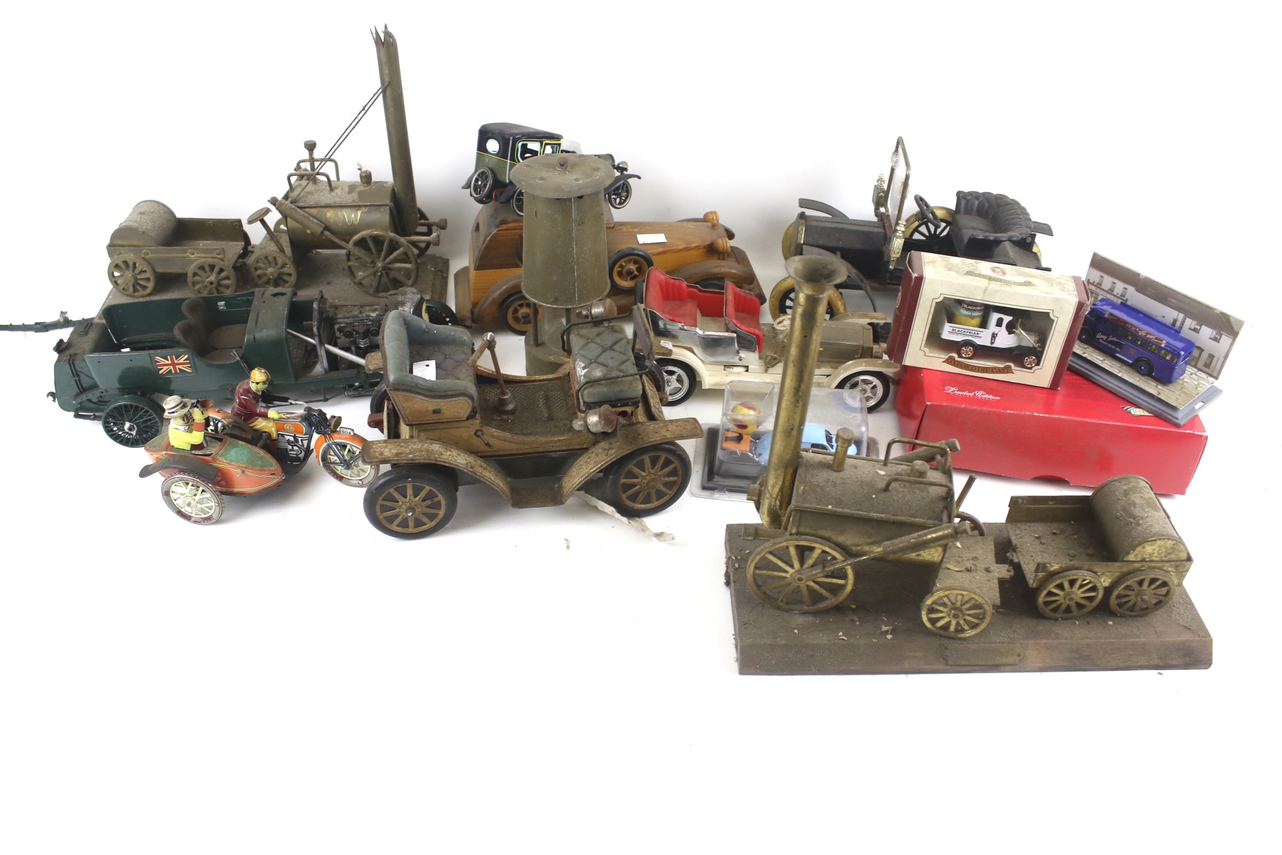 A collection of toy and model cars and vehicles. Including Corgi, etc.