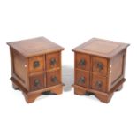 A pair of Indonesian hardwood bedside chest of drawers.