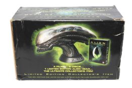 Alien limited edition collector's item. Including box set Alien Quadrilogy, and an Alien head.