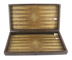 A vintage wooden back gammon folding board. L47cm x D25cm x H7cm (closed).