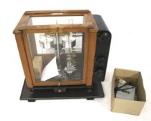 A vintage scientific instrument Stanton BA6 laboratory balance scales. In a glazed wooden case.