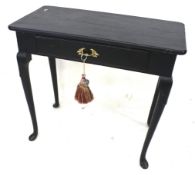 A Georgian style painted pine hall table.