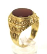 A vintage 9ct gold and carnelian oval signet ring.