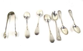 A sugar tongs and a set of six silver feather-edge tea spoons.