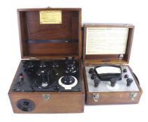 Two vintage wooden cased scientific meters.