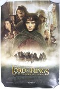 THE LORD OF THE RINGS: The Fellowship of the Rings - a movie poster signed by Elijah Wood.