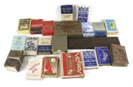 An assortment of vintage games. Including playing cards, a cribbage board, etc.