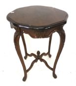 An early 20th century walnut circular centre table.