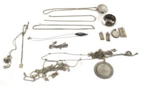 A collection of silver jewellery to include three silver 'ingot' pendants;