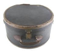 A vintage leather hat box.