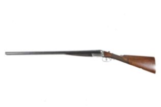 A Cogswell and Harrison box lock ejection 12 gauge shotgun. S/N: 25615, 28" barrels, 2.
