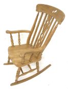 A Norfolk rocking chair.