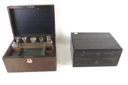 Two vintage wooden jewellery boxes. With interior trays and one with glass bottles.