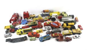 An assortment of playworn diecast vehicles.