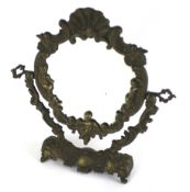 A Victorian style cast metal swing mirror.