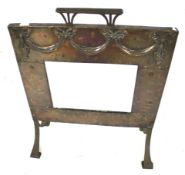 An early 20th century 'Arts and crafts' style fire screen.