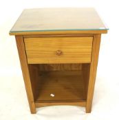 A small cabinet single drawer unit.