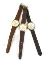 Three gentleman's gold-plated round wrist watches.