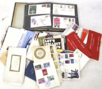 A collection of British first day covers.