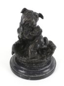 A Florence patinated bronze model of dogs in basket.