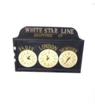 A reproduction 'Whitestar Line' wall clock.