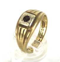A vintage 9ct gold and garnet signet ring.