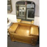 A vintage oak dressing table with mirror.