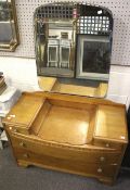 A vintage oak dressing table with mirror.