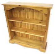 A contemporary pine freestanding bookcase.