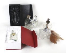 A collection of Victorian and later perfume bottles.