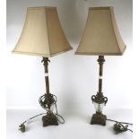 A pair of contemporary gilt metal table lamps.